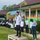 Mudir Pesantren Darul Arqam Tolada Tekankan Disiplin Belajar dalam Upacara Bendera